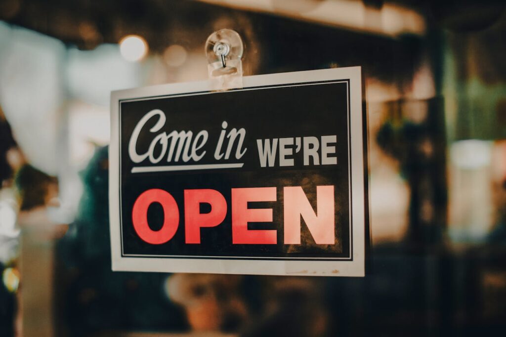 pexels-photo-19418844 Charming open sign displayed at a shop, inviting customers inside a welcoming retail environment.